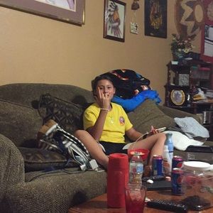 Hair;blonde and brown  eyes:brown   height: 5’5